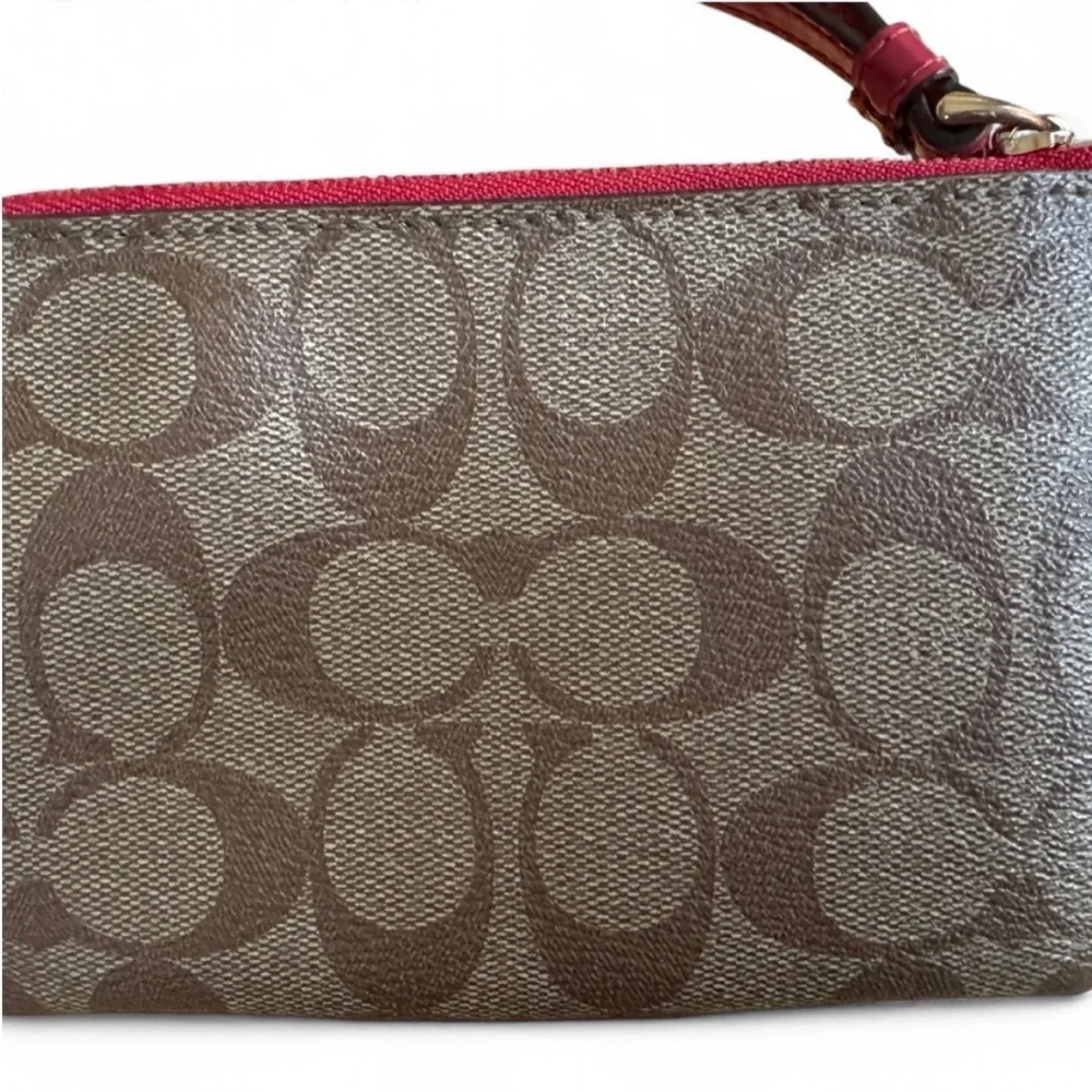 Coach Signature wristlet in light Brown and Red